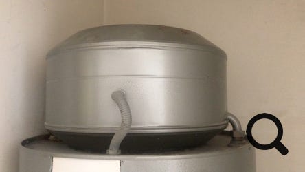 Pulsacoil III 3 header tank showing water level marker line.